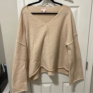 Pink Lily tan sweater with pocket and flare sleeves
